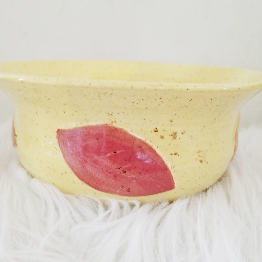 Pottery mixing bowl leaf pattern.